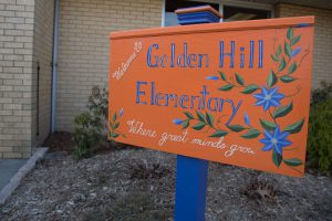 A welcome sign in front of Golden Hill Elementary