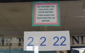 Sign on the window that says 2 2 22 and Do the best you can until you know better. Then when you know better, do better.