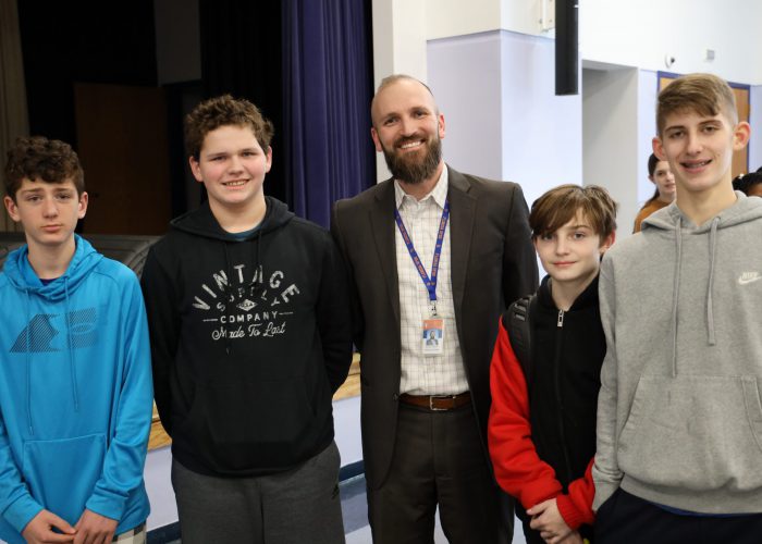 Photo of Seward Principal Maesano with Seward Students- March 2023