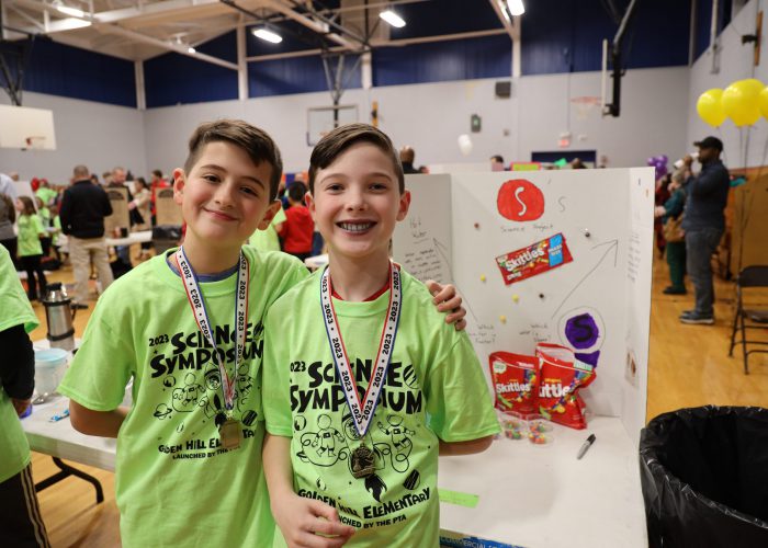 Photo of two students at the Golden Hill Science Symposium