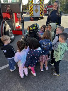 Golden Hill Elementary Students touching fire equiptment
