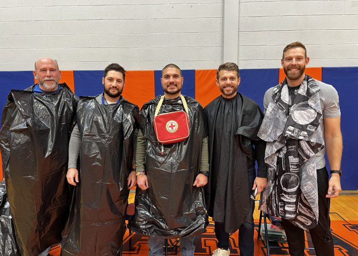 Teachers pose for No Shave November Event