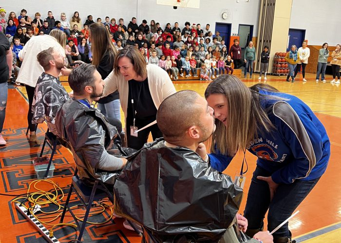 Teachers pose for No Shave November Event