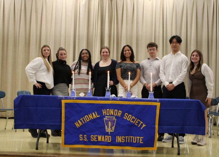 Students in front of Banner