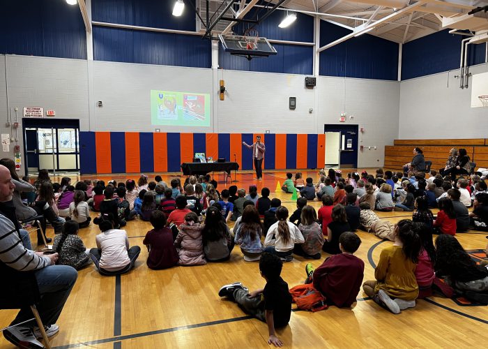 Students watching teacher presentation