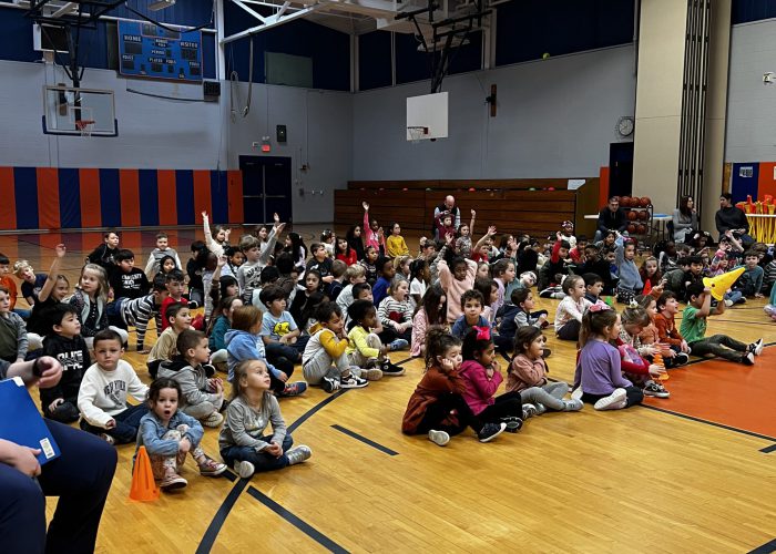 Students watching teacher presentation