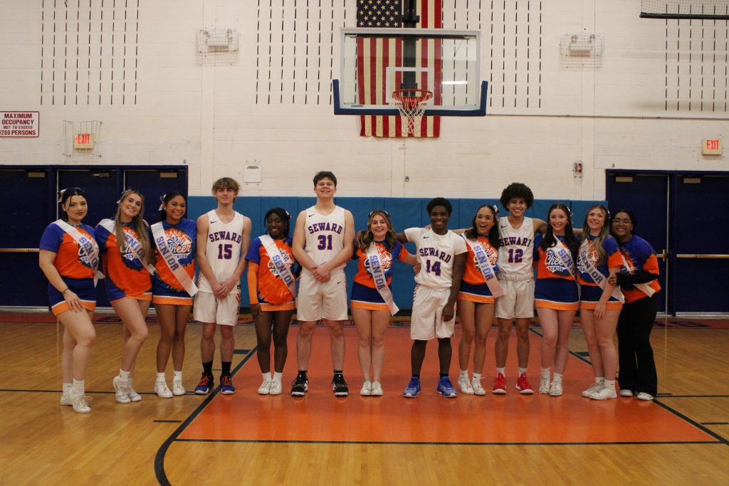 Senior athletes pose for photo in gymnasium