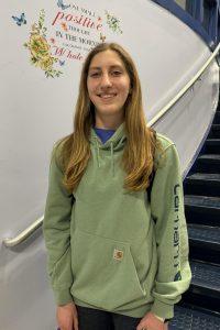 Basketball player Brooke Ehlers smiles for the camera