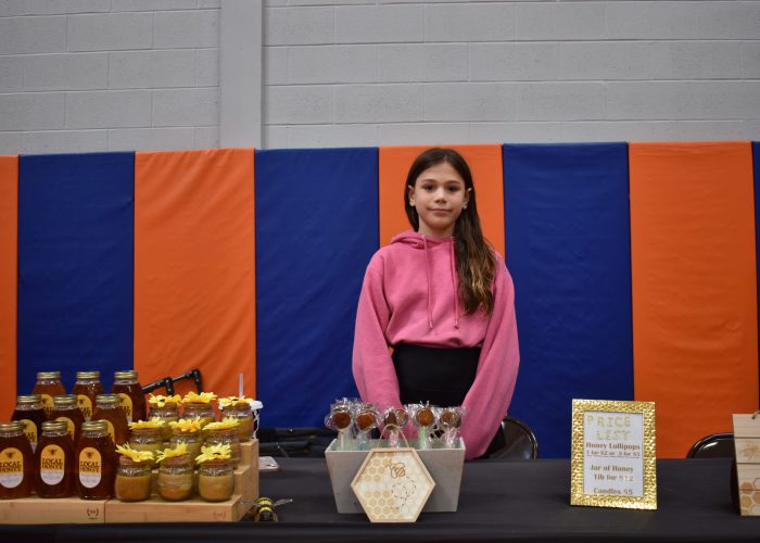 Pyper Jahrling sells her products at TREP$ market