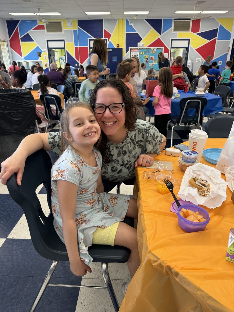 Student poses with her mom