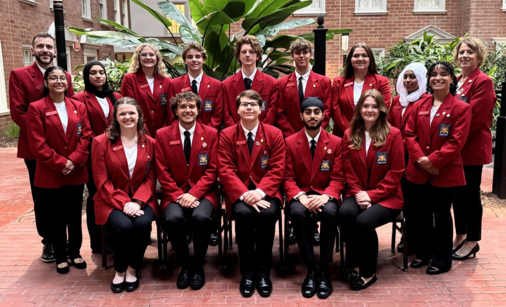 Group of students in red blazers