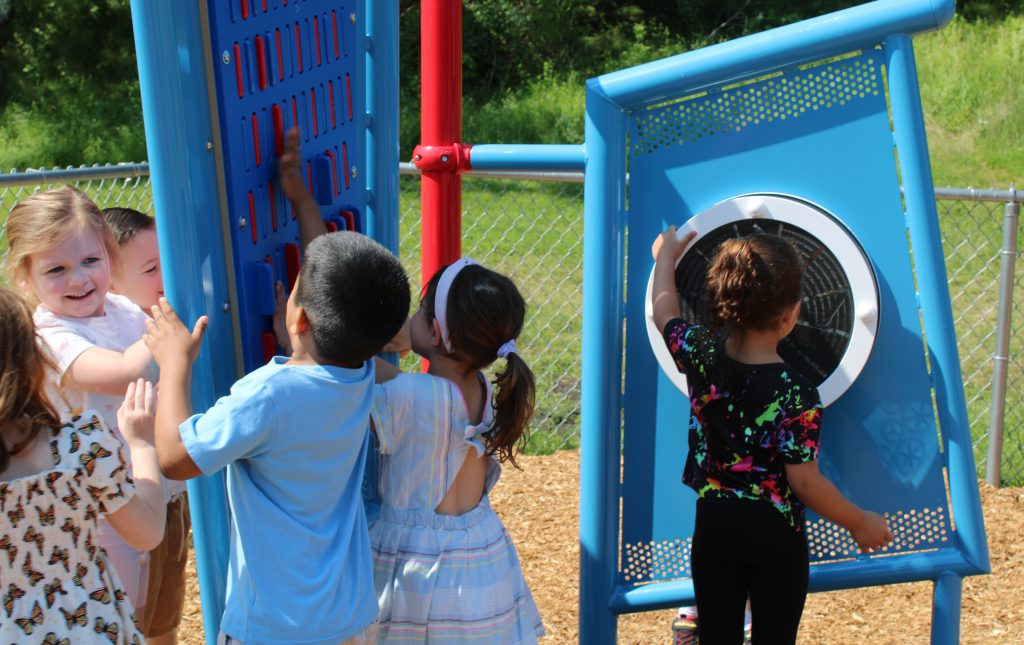 Students playing at new playground